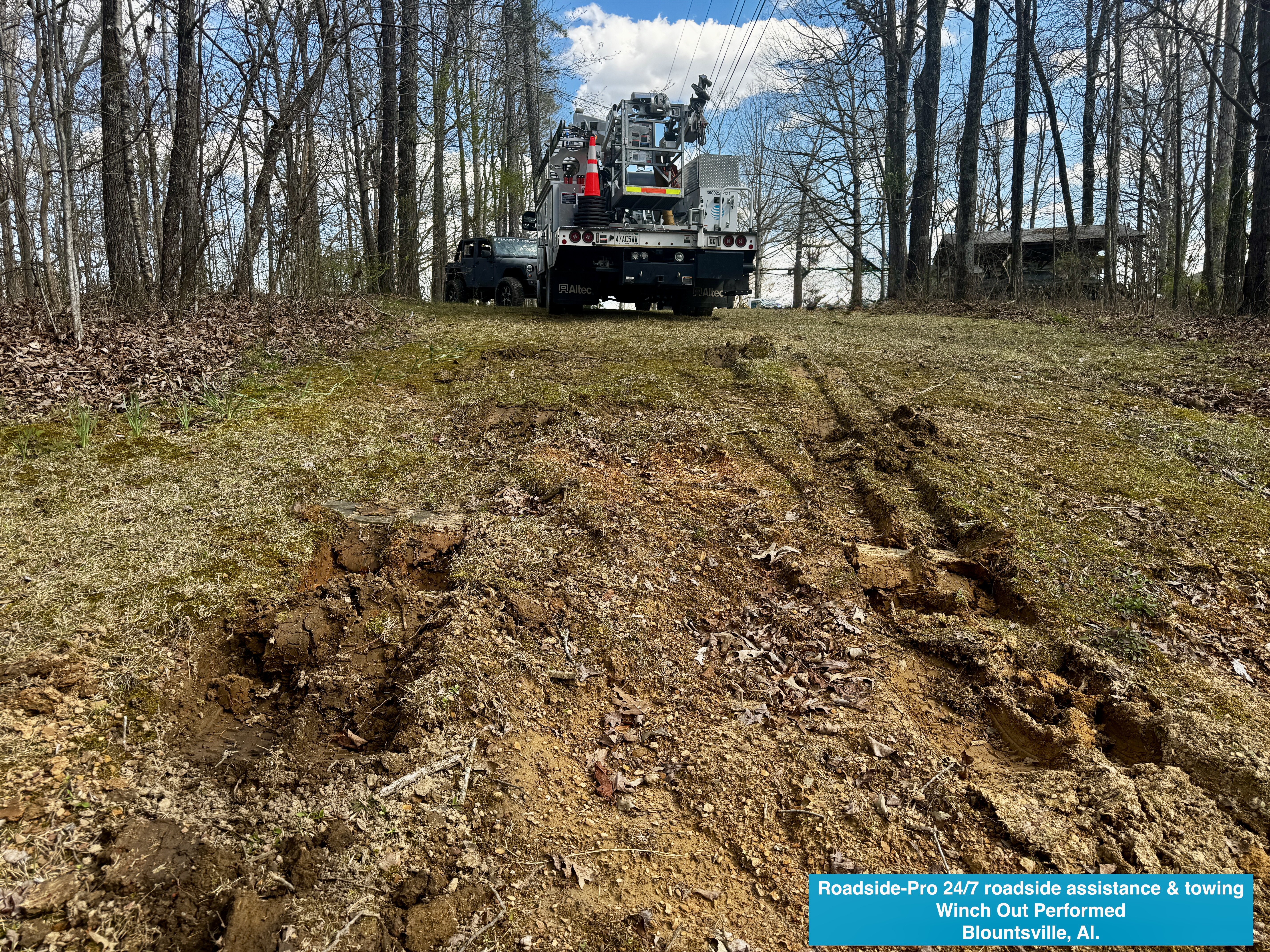 Roadside-Pro 24/7 roadside assistance & towing performing a winch out