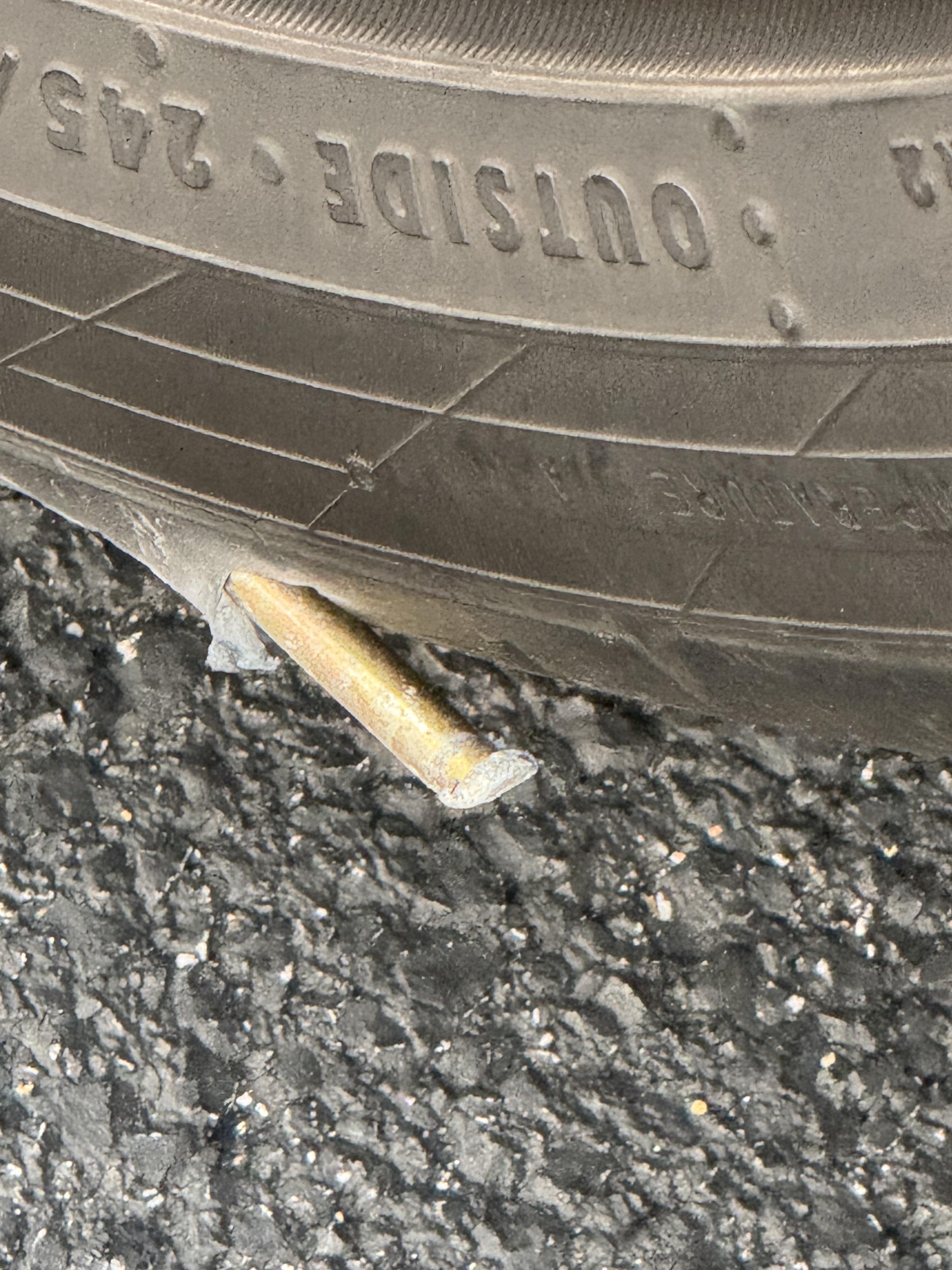 Roadside-Pro 24/7 roadside assistance performing tire change service.